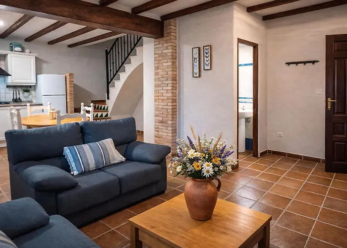 Masía de San Juan Casas Rurales con piscina y vistas a la montaña